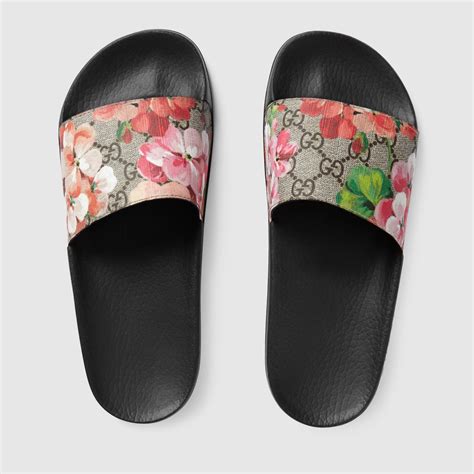 women's gucci slides blue flowers.